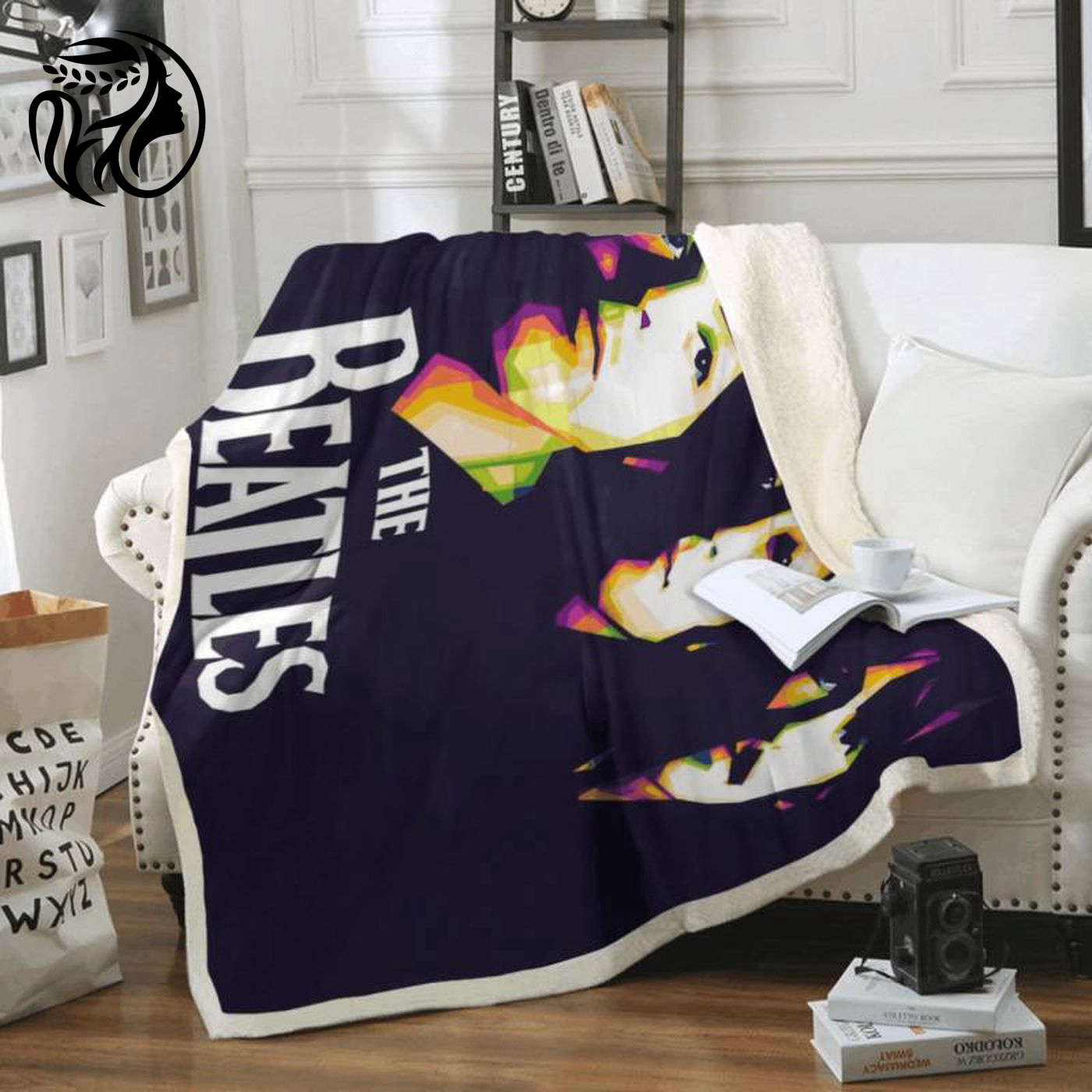 The Beatles Rock Band 1960 Fleece Blanket: Embrace your love for The Beatles with this cozy must-have!
